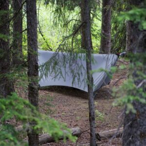 3 season grey hammock tarp setup in the forest